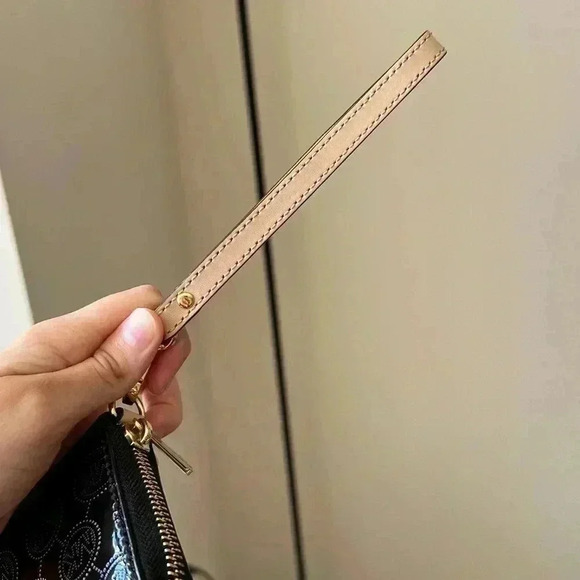 Michael Kors Black Wristlet with Gold Accents - Picture 8 of 14